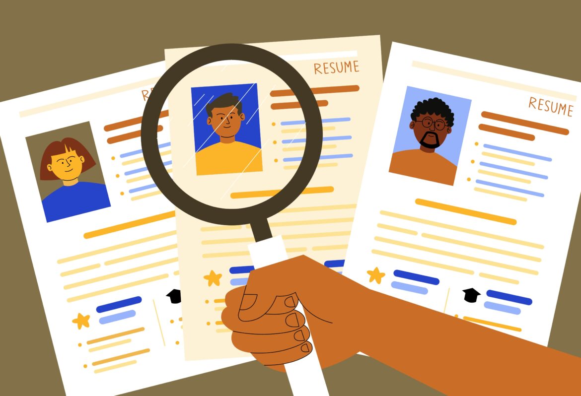 Illustration of several resumes spread out, with a magnifying glass highlighting one candidate's photo on a resume in the center.