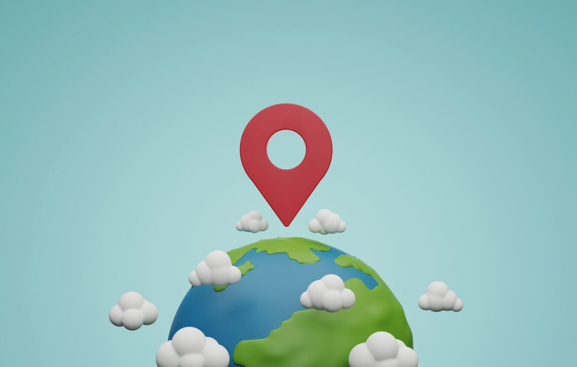 Red map pin hovering above a cartoon Earth with clouds, indicating a global location