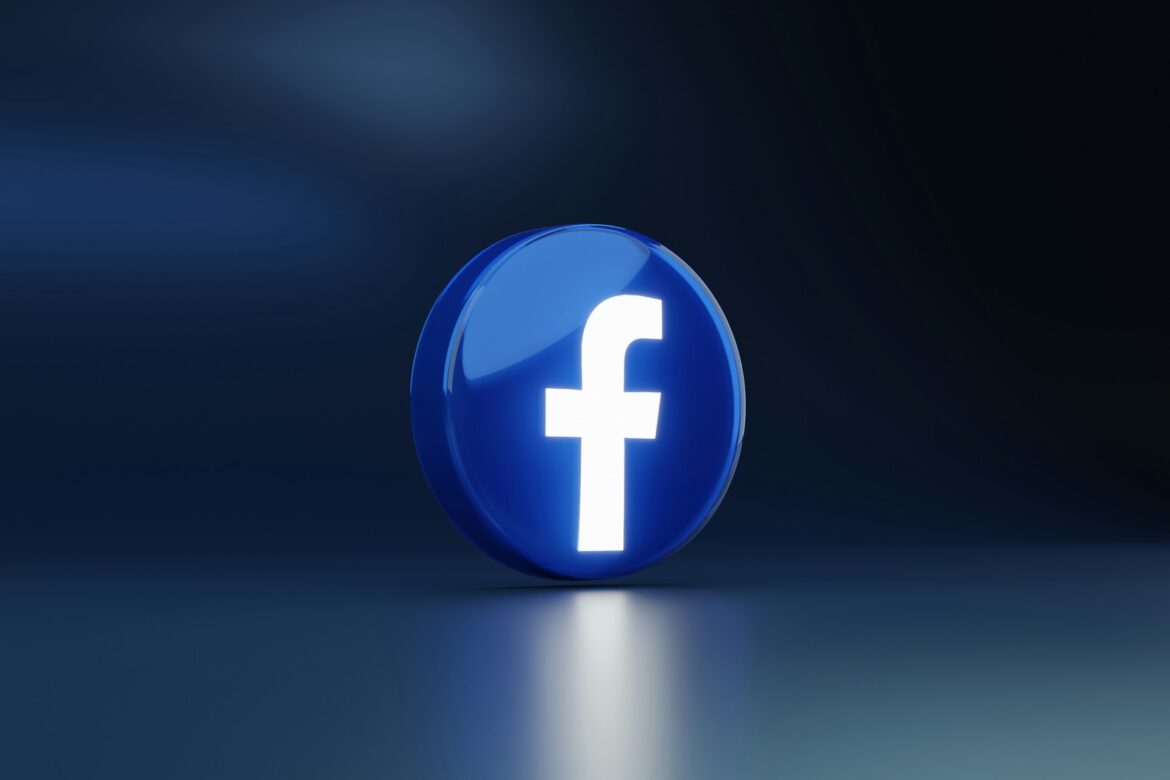 Blue glossy spherical Facebook logo with a white 'f' on a dark blue background.